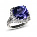 A cushion cut Tanzanite weighing 13 carats mounted with diamonds in 18K white gold thumbnail