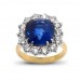 A cushion cut Sapphire weighing 6.97 carats set with diamonds in 18K white and yellow gold thumbnail