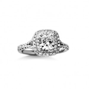 A 1.80 carat cushion cut diamond mounted in 18k white gold with diamonds