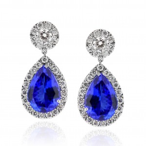 A pair of Tanzanite earrings weighing 6 carats each mounted with G VS diamonds in Platinum